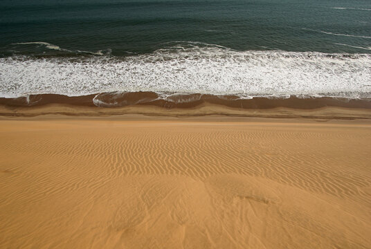 Dune landscape along the Atlantic ocean coastline in Namibia