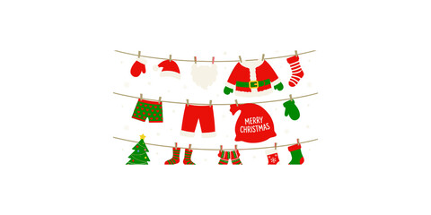Festive christmas santa clothes and decorations hanging on clothesline with snowflakes on gray background. © Zohaib Masih