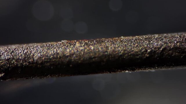 Microscope macro shot of graphite pencil lead with selective focus transition