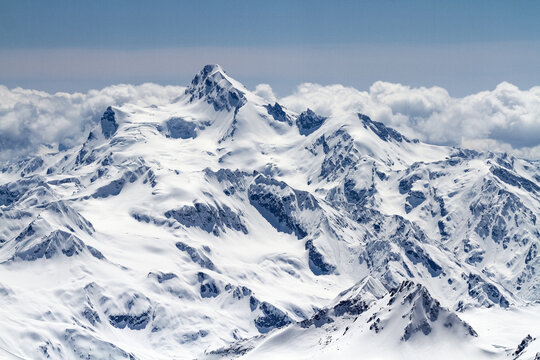 Stunning snow capped mountain range on a sunny day