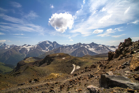 Majestic snow capped mountain range in summer