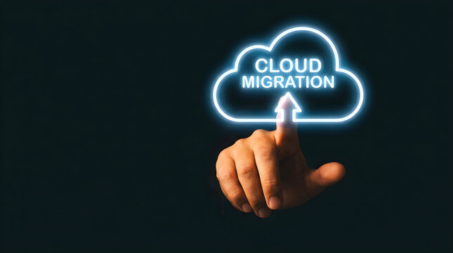 Hand pointing at glowing cloud migration text icon on dark digital