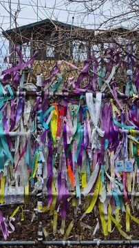 Vertical View of Colorful Ribbons on Fence in DMZ Demilitarization Zone, North and South Korea Border