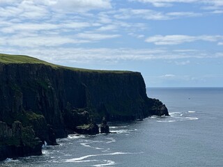 Rugged coastal Cliffs of Moher overlooking the Atlantic Ocean in County Clare, Ireland, July 2025 © Sergei