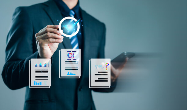 Business person using a pen to select a glowing quality checkmark icon over digital report documents. Concept of business compliance, quality control, approval, and standard management.