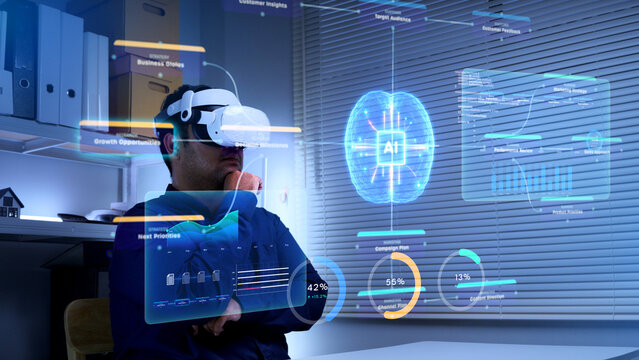 Businessman wearing VR headset analyzing futuristic digital data holograms in modern office
