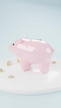 Pink piggy bank with gold coins rotating on a white turntable (vertical)