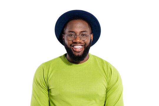Portrait of pretty guy wearing green pullover looking smiling isolated over white background