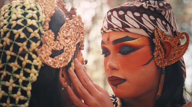 Tender Moment Between Two Traditional Javanese Dancers