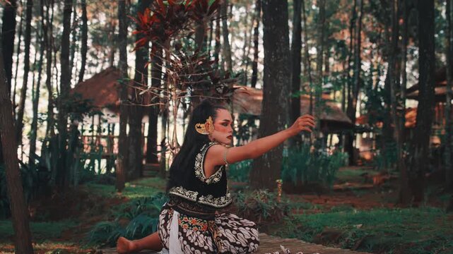 Javanese Dancer Performs Ritual, Throwing Batik Cloth in the Air