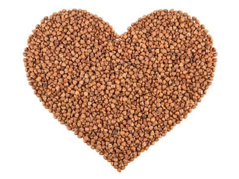 Buckwheat heart shape arranged on black
