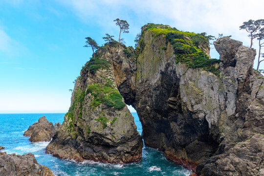 Towering coastal rock formations and sea cliffs at Kitayamazaki on the Sanriku Coast in Iwate, Japan
