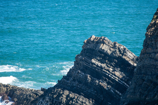 Rugged Coastal Cliffs Overlooking the Deep Blue Ocean