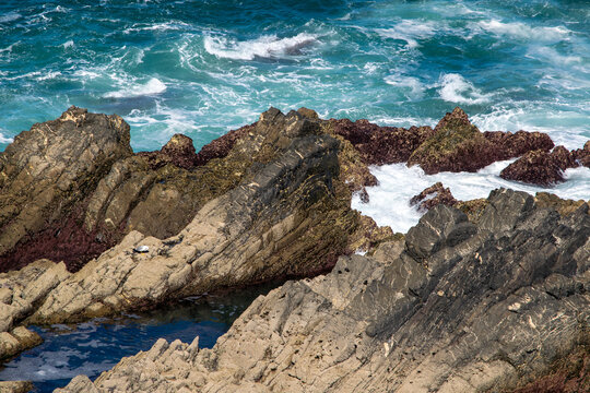 Rugged Coastal Cliffs with Crashing Ocean Waves
