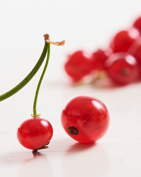 Red currants close-up with fresh vibrant red berries