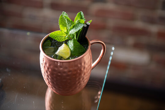 Moscow mule cocktail garnished with fresh mint and lime wedge