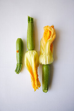 Mini zucchini with yellow squash blossoms