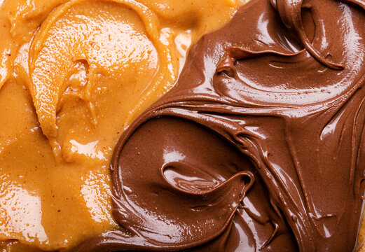 Close-up of creamy Peanut butter and chocolate spread with glossy