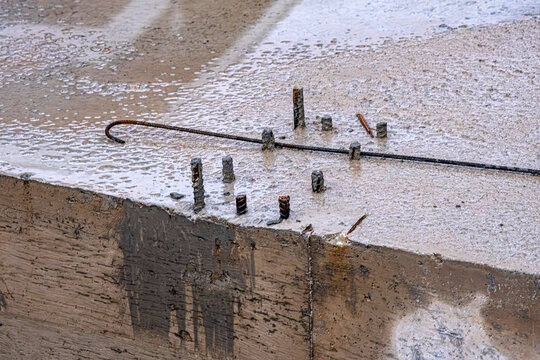 Concrete foundation with steel rebar. Ideal for civil engineering websites, building industry brochures, infrastructure blogs, and contractor presentations.
