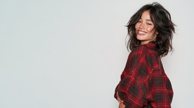 Hispanic girl with messy hair in oversized flannel shirt grunge style isolated on white background