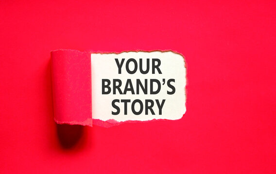 Branding and your brands story symbol. Concept words Your brands story on beautiful white paper. Beautiful red paper background. Business branding your brands story concept. Copy space.