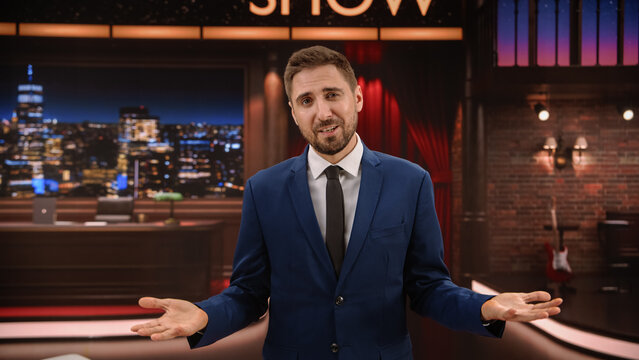 Male Late Night Show Host Presenter Presenter Performs a Cheerful Opening. Charismatic Comedian Performance and Guest Introduction Content. Mockup Playback Cable Channel Television Studio