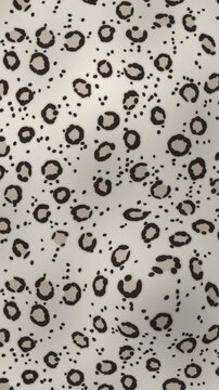 Seamless vertical pattern of white and black snow leopard animal skin