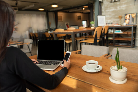 Businesswoman hands type on laptop notebook meeting at office desk. female working home office firm with business stuff smartphone coffee cup. Woman hands using laptop planning home online meeting
