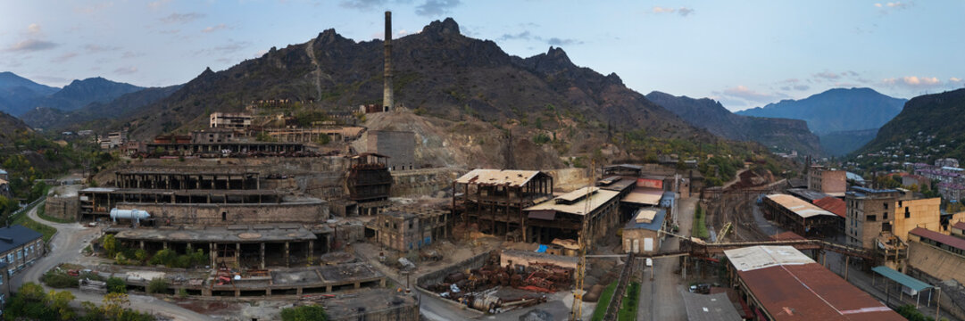 Historic copper mine ruins with industrial buildings in Alaverdi