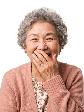 Senior woman laughing hand over mouth transparent background giggle grandmother curly gray hair and pink cardigan isolated cutout for advertising social media posts and presentations