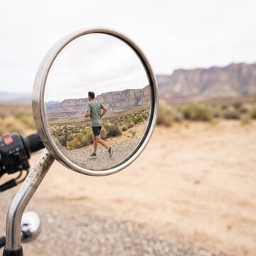 Desert Runner Reflected in a Motorcycle Mirror