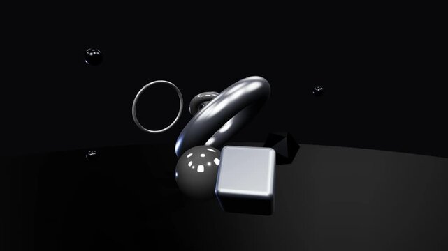 Metallic Geometric Shapes Floating and Rotating with Chrome Reflections on Dark Background