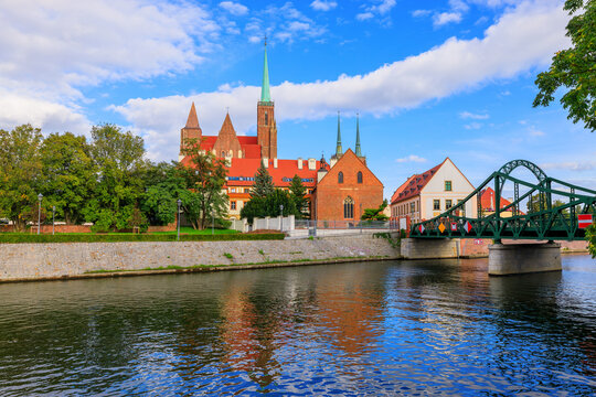 Wroclaw, Poland. Cathedral Island - Tumski Bridge and Collegiate Church of the Holy Cross and St. Bartholomew.