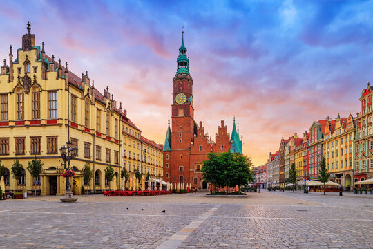 Wroclaw, Poland. New City Hall and Old Town Hall on Market square at sunrise.