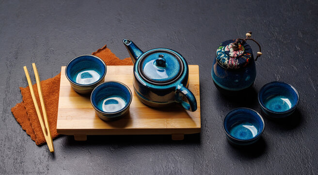Asian tea ceremony set with teapot and cups