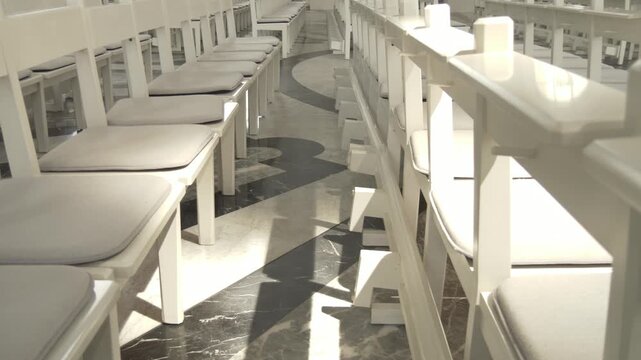 Perspective View Through Rows of Church Benches