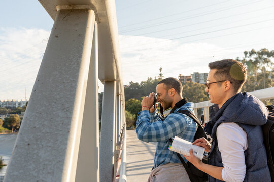 Friends Capture Scenic Views on a Bridge Adventure