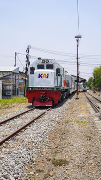 General Electric CC 201 77 16 diesel locomotive pulling Sancaka Utara train stopped at Gundih railway station in Grobogan Regency, Central Java, Indonesia.