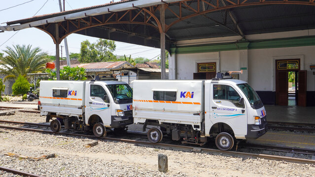 Track inspection vehicles (Kendaraan Pemeriksa Jalur Rel / KPJ) of Kereta Api Indonesia (KAI) stopped on the railway track at historic Gundih Station in Grobogan, Central Java, Indonesia.