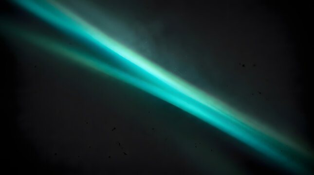 Abstract diagonal teal and cyan light beams cutting through a dark smoky background with soft glowing edges, creating a futuristic and mysterious mood ideal for technology backgrounds, digital art