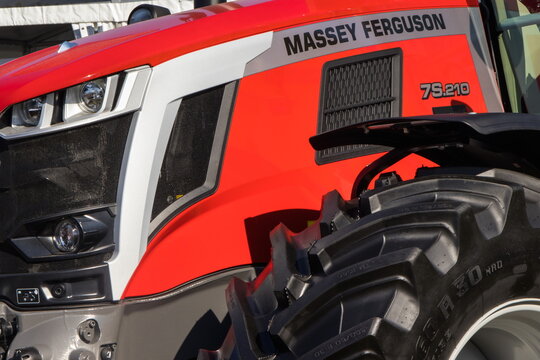 Bednary, Poland - September 21, 2024: Agroshow. Massey Ferguson brand tractor machine. Manufacturer agricultural equipment. Detail and part of vehicle