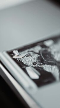 Relief map tablet corner reveals a blade platform
