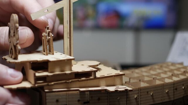 Detailed Wooden 3D Puzzle Ship Construction Closeup. Creative DIY Wooden Steampunk Ship Model Building