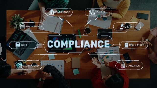A diverse group of professionals collaborates around a conference table, discussing compliance strategies and frameworks, emphasizing governance and rules in a modern workspace. Raster