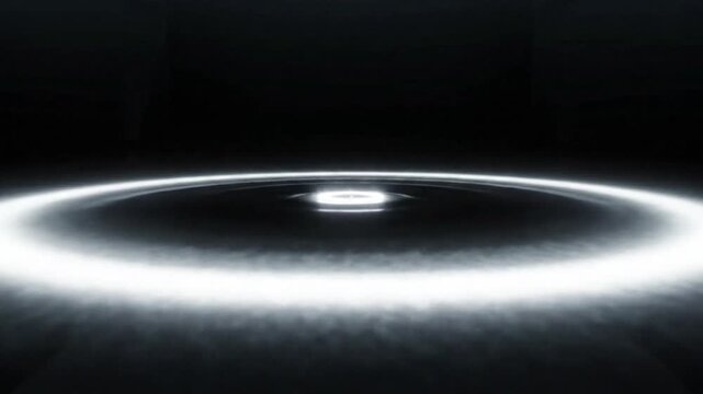 Futuristic glowing white light ring expanding on dark ground surface, sci-fi energy shockwave VFX element