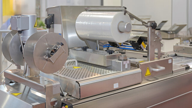 Foil Thermoforming Packaging Machine at Food Production Line