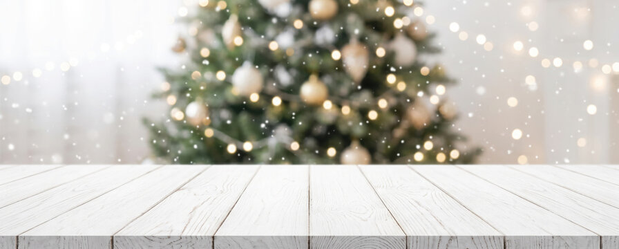 Empty white wold table top with abstract warm living room decor with christmas tree string light blur background with snow,Holiday backdrop,Mock up banner for display of advertise product.