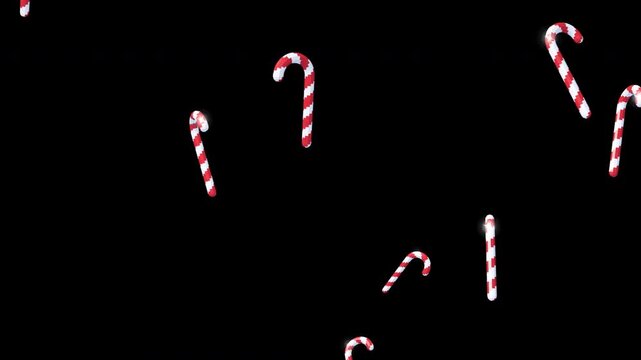 Christmas candy canes falling down on a transparent alpha background