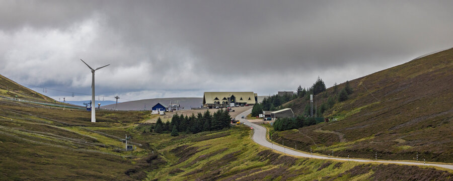Winding road to Lecht Ski Centre through misty moorland in the Cairngorms National Park, Scottish Highlands