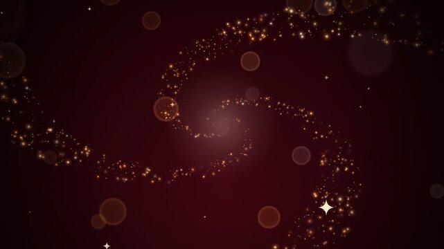 Golden sparkling dust trail with bokeh and stars on a dark red background, motion graphic clip